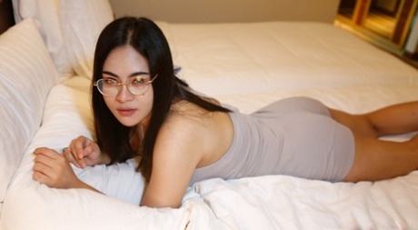 Asian babe Moemoe flaunts her big ass while stripping for some POV sex