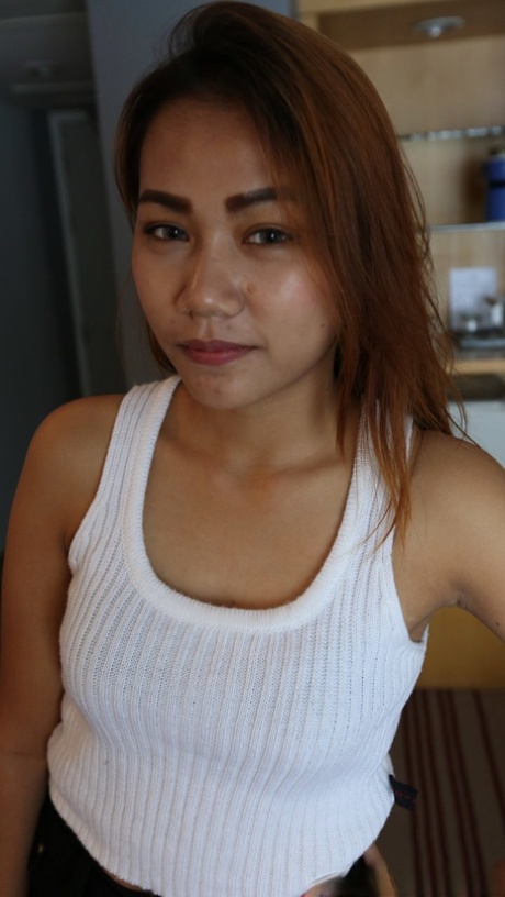 Redheaded Asian teen Meen B strips naked, gives a handjob and fucks in POV