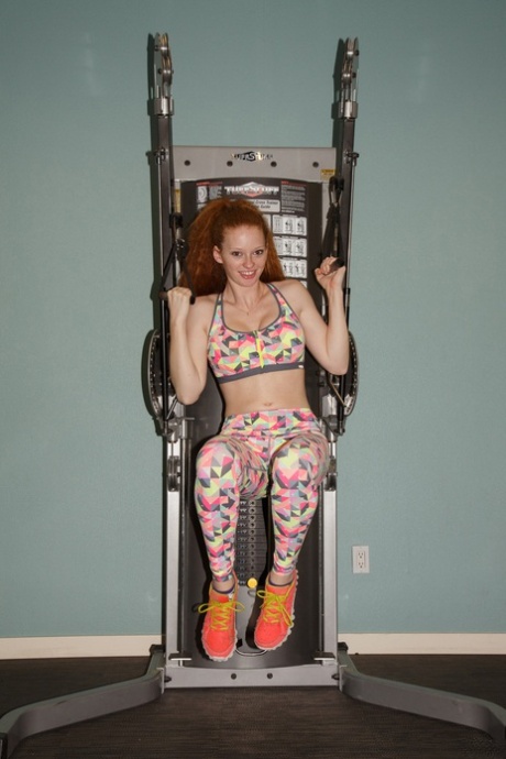 Teen with red hair Wendy Patton gives a sneak peek if her nipple at the gym