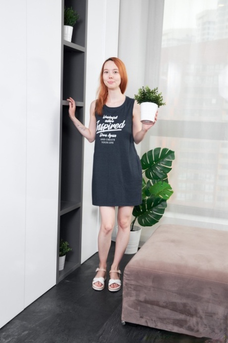 European ginger teen Emily A unveils her slim figure and toys her pussy