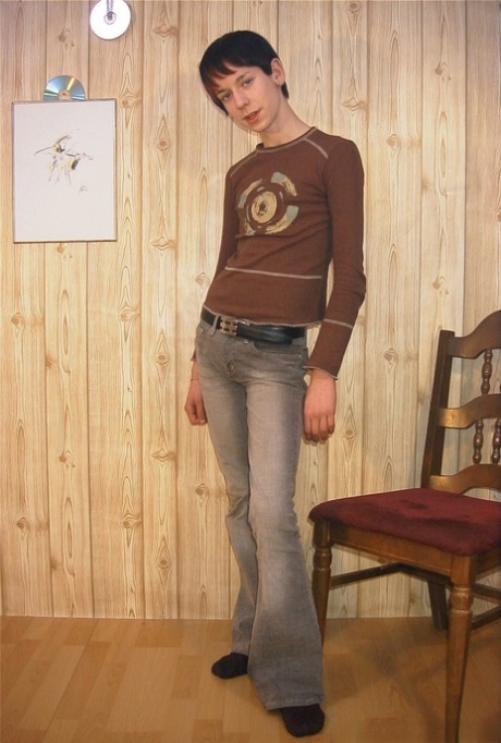 Skinny twink strips completely naked & shows off his big uncut cock