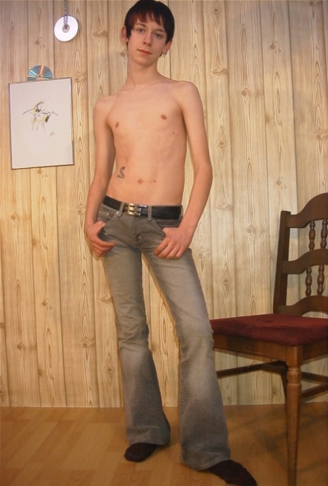 Skinny twink strips completely naked & shows off his big uncut cock