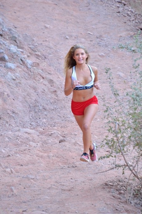 Foxy amateur blonde Nicky stripping naked and posing while hiking